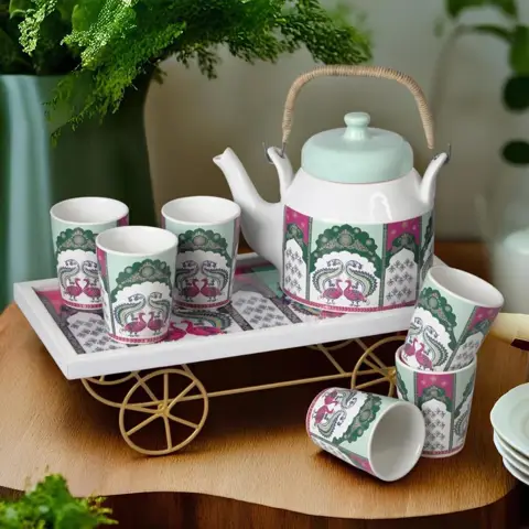 Peacock ceramic tea set on a thela style stand